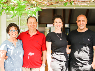 Shona and Paul Kraayvanger with the new Canungra Hub owners Verity Robinson and Ivan Tapia.