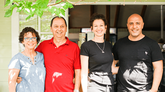 Shona and Paul Kraayvanger with the new Canungra Hub owners Verity Robinson and Ivan Tapia.