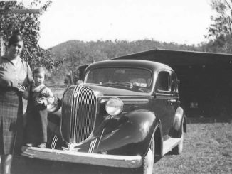 Agnes Curtis with Joyce Libke and their Plymouth car, circa 1939.