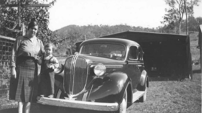 Agnes Curtis with Joyce Libke and their Plymouth car, circa 1939.