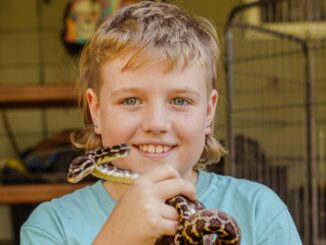 Max McMahon and Daisy the Rough Scaled Python