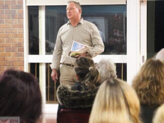 Cr Stephen Moriarty speaks at the community meeting